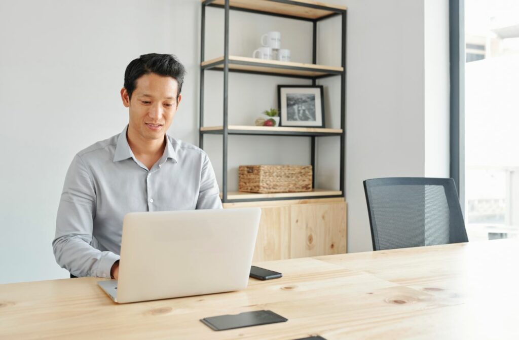 Businessman Working On Laptop