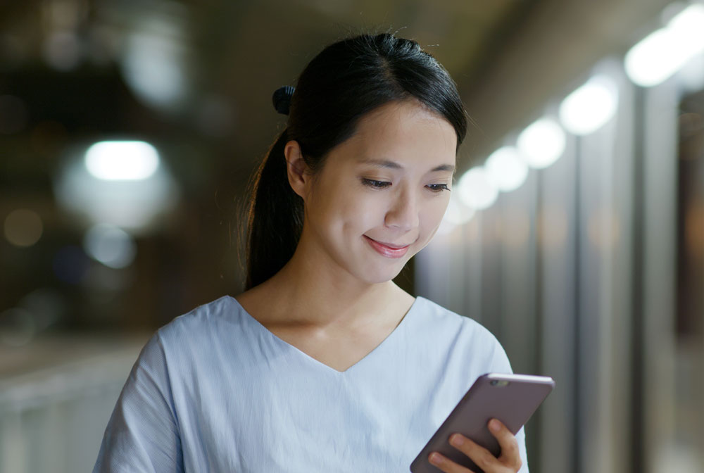 Woman Looking At Phone