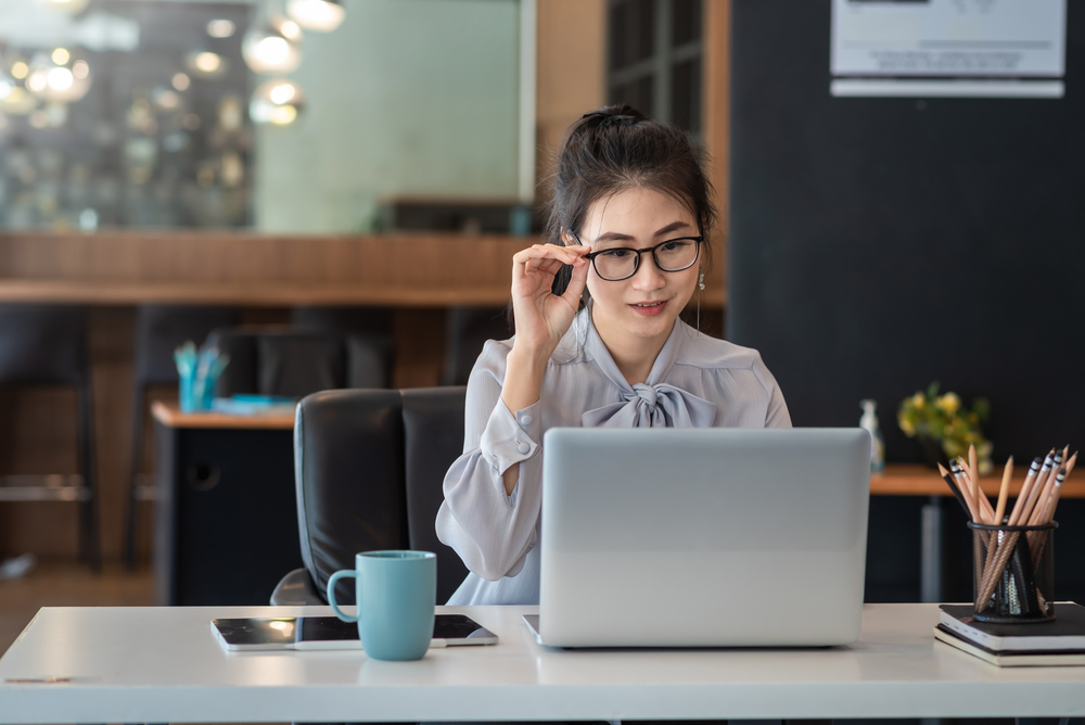 woman researching on e-commerce marketing strategy