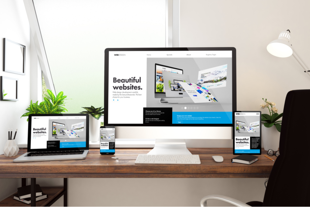 beautiful websites shown in a pc monitor, laptop, tablet and a mobile phone