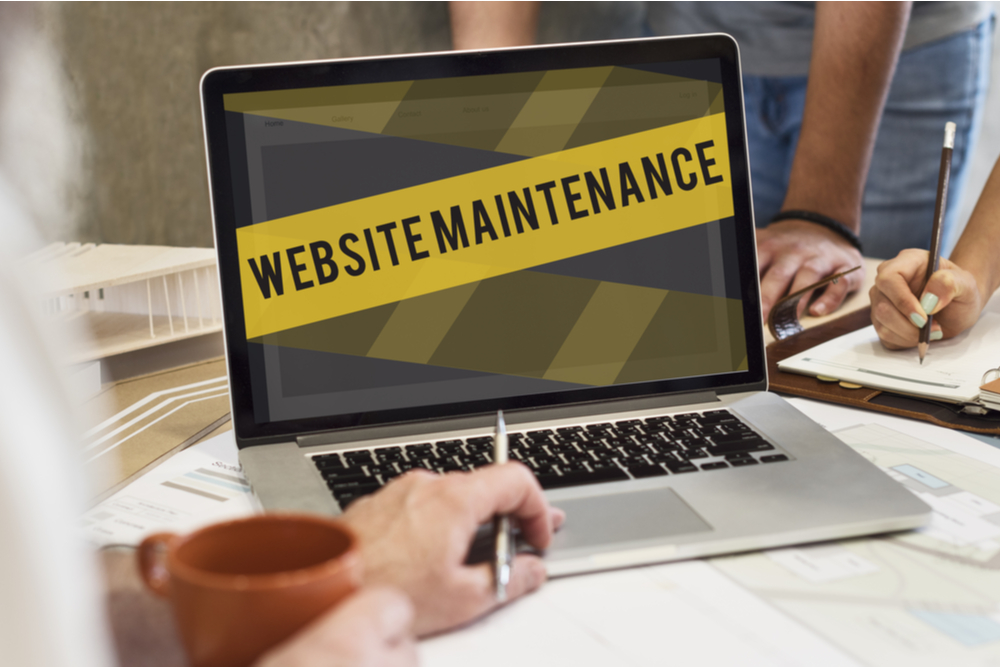 website maintenance shown in a laptop screen