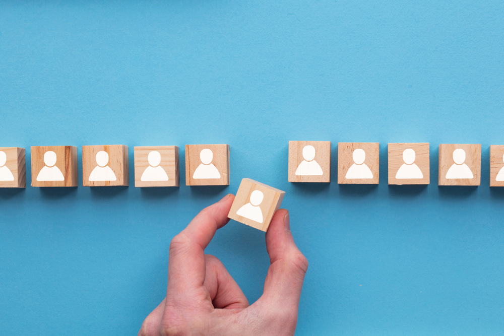 human wooden blocks symbolizing potential customers