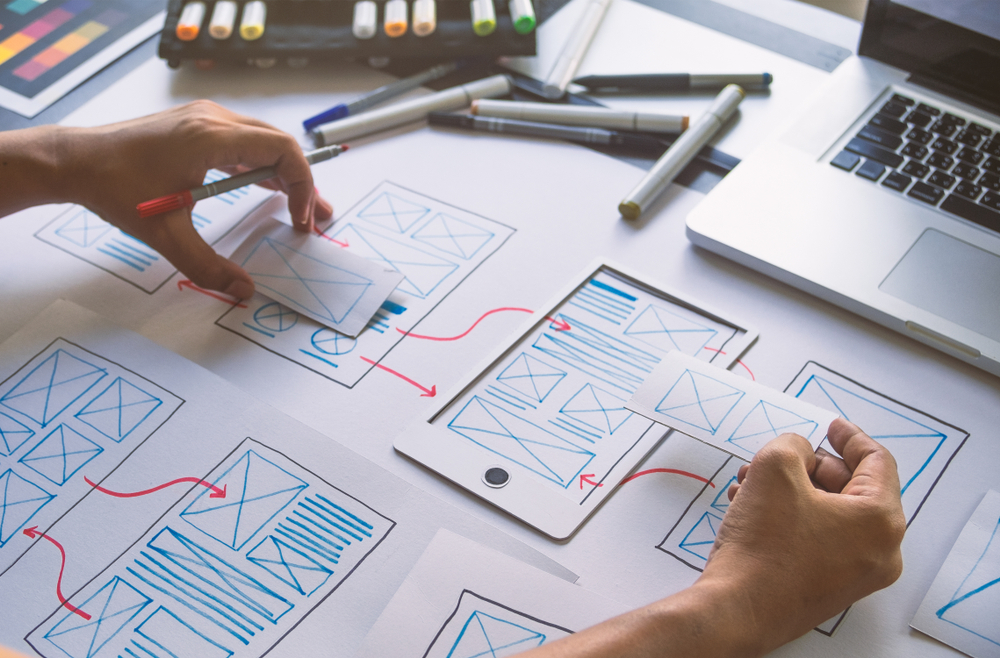 UI graphic designer sketch planning and mapping process